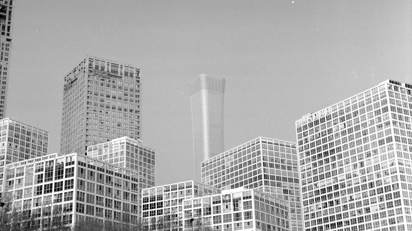 Modern skyscraper against blue sky