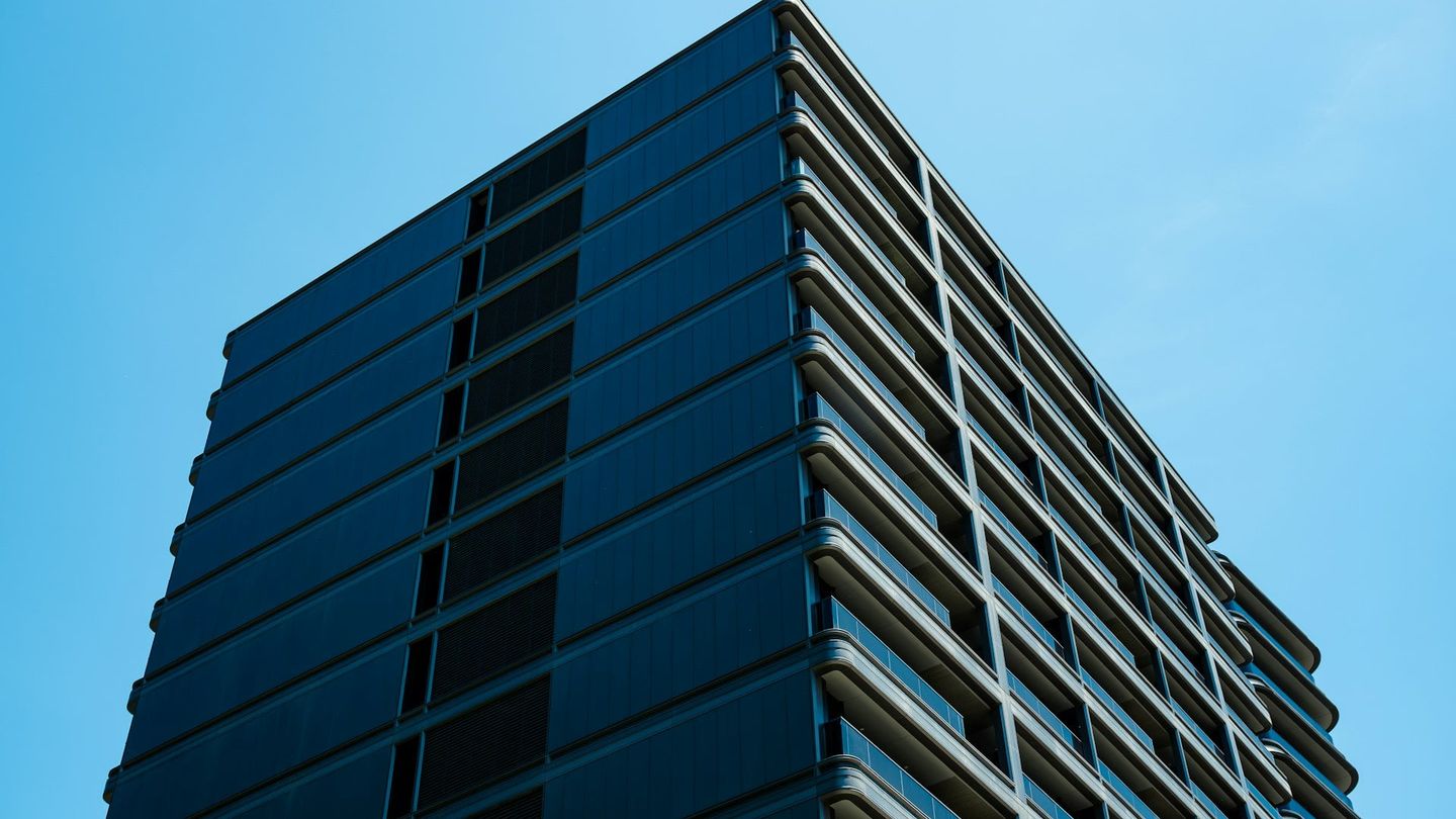 Modern commercial building under blue sky