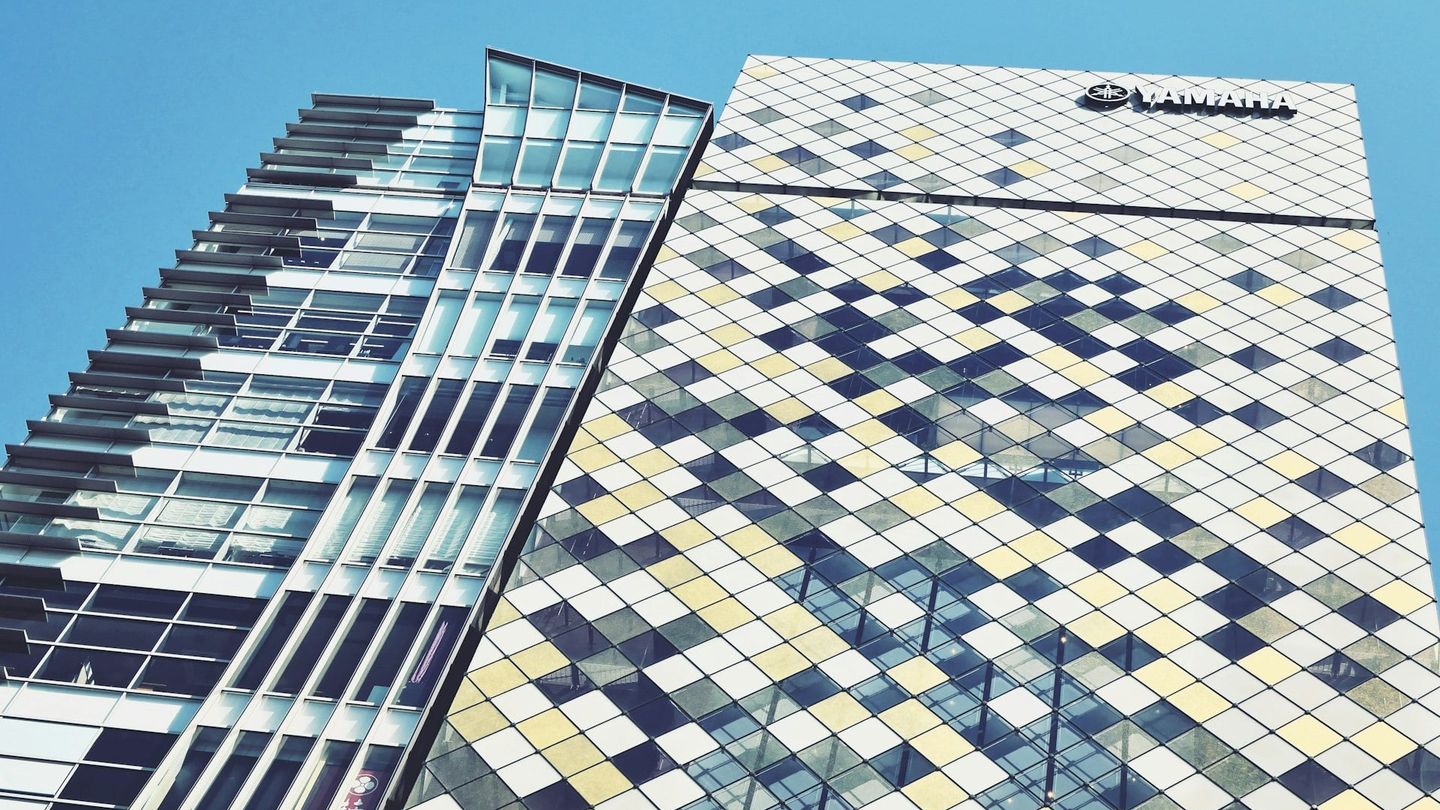 Modern office building under bright sky