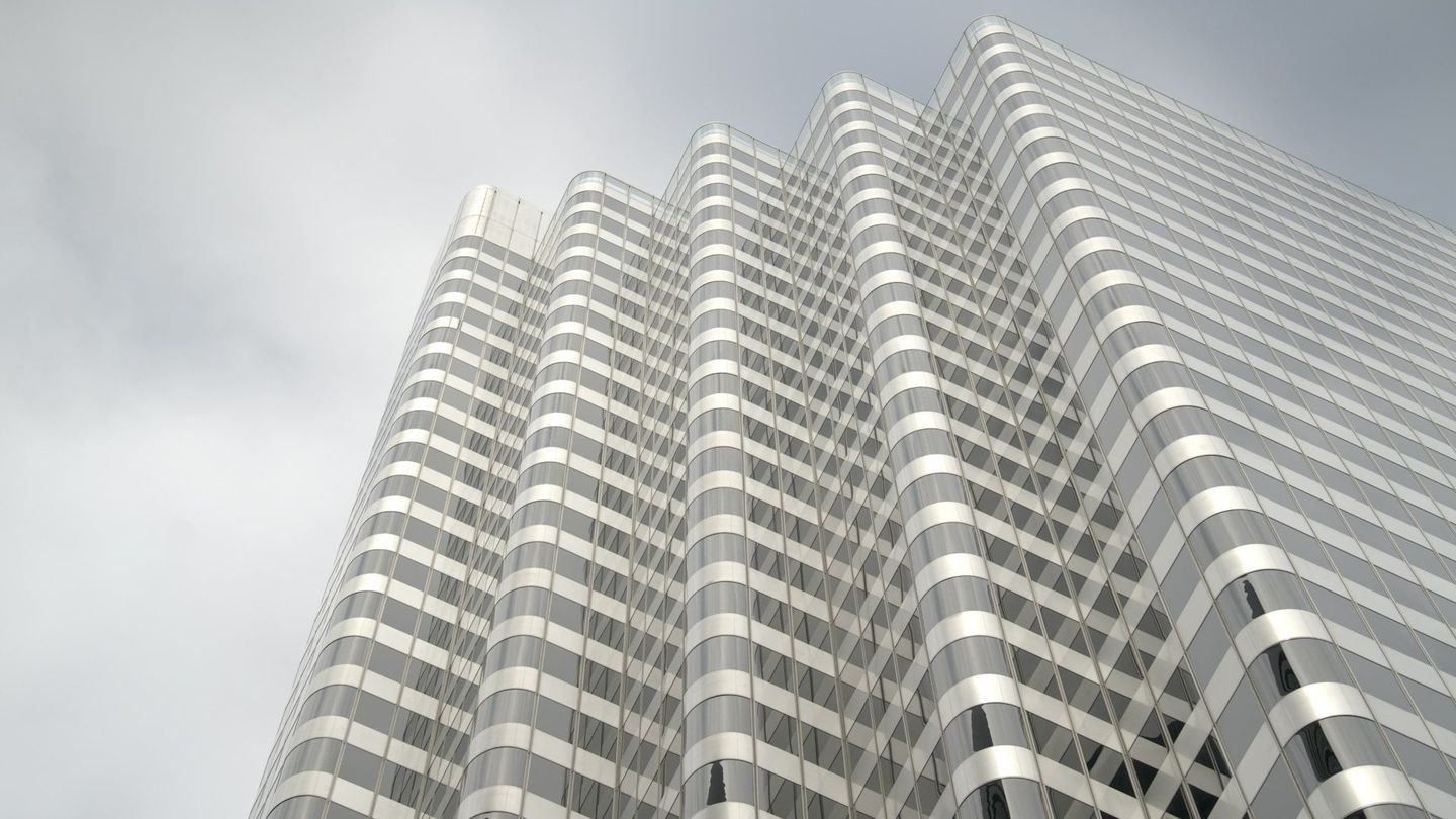 Modern skyscraper reflecting sunlight