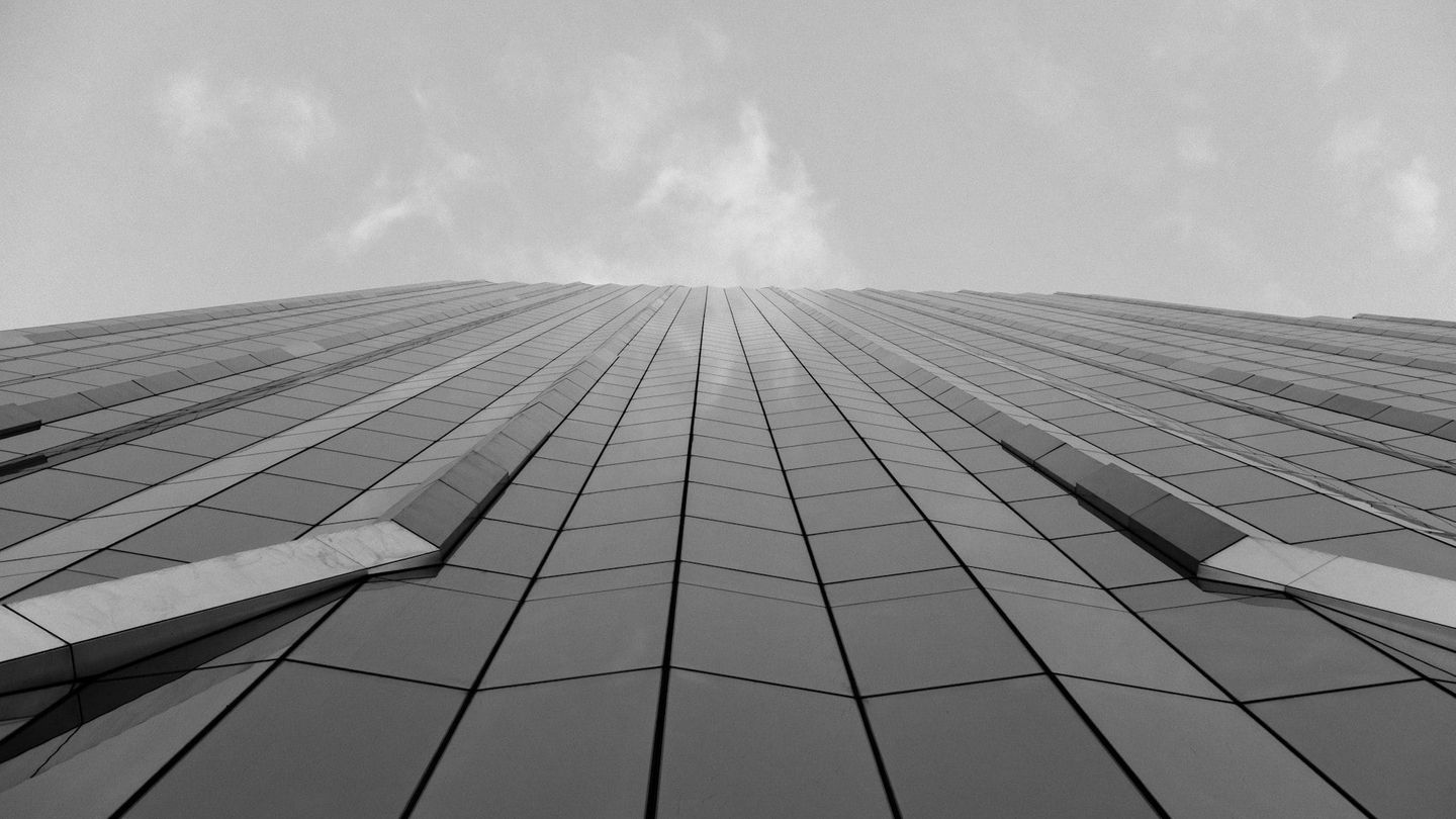 Modern skyscraper under bright sunlight