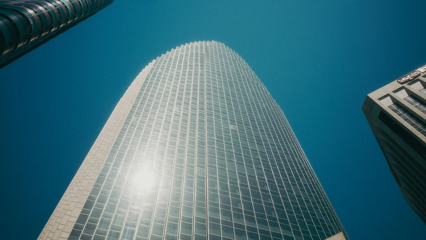 Modern skyscraper reflecting sunlight