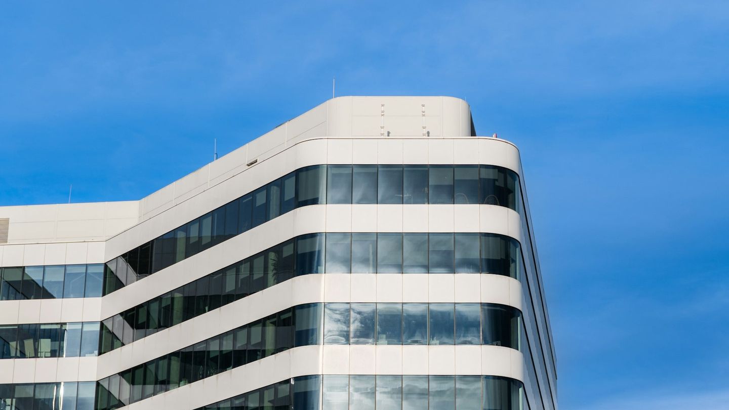 Modern office building under bright sunlight