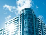 Modern office building under bright sky