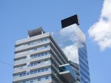 Modern office building under blue sky