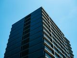 Modern commercial building under blue sky