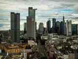 Modern financial district under bright sky