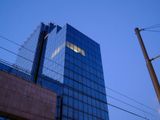 Modern office building under blue sky
