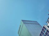 Modern office building under blue sky