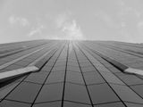 Modern skyscraper under bright sunlight