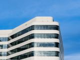 Modern office building under bright sunlight