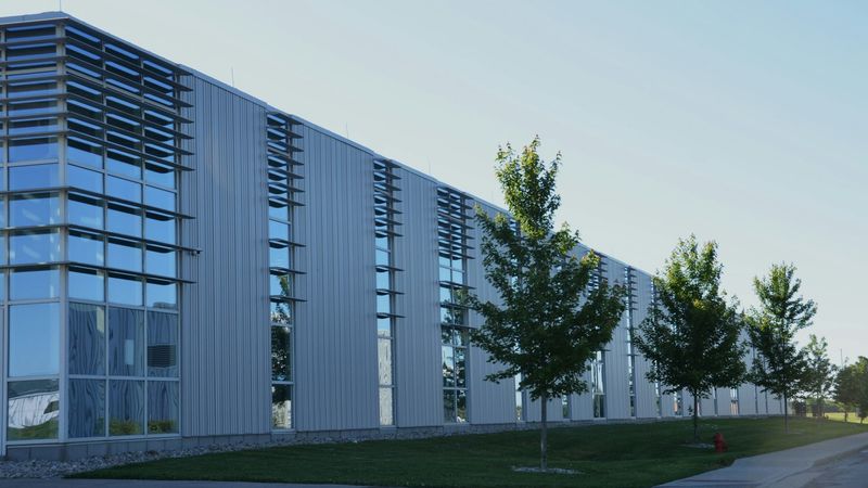Modern office building under bright sky