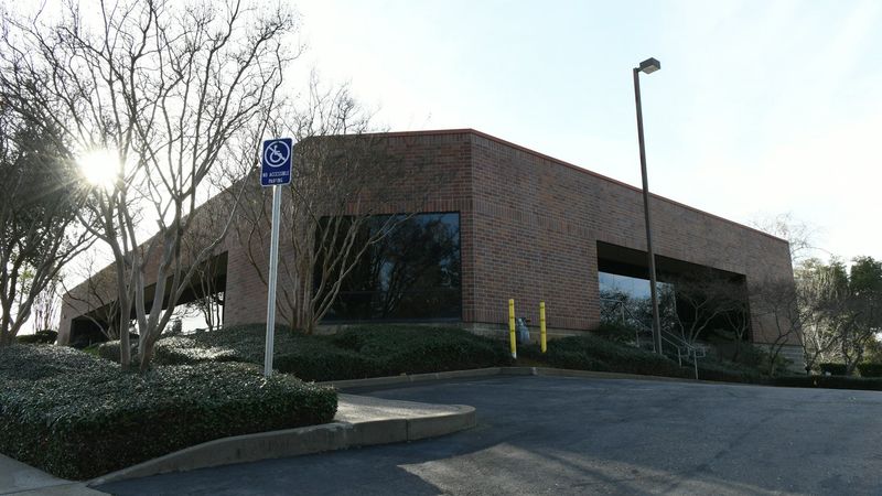 Modern office building under bright sky
