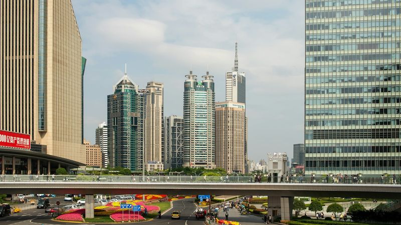 Modern financial district under bright sky
