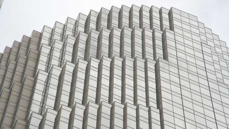 Modern skyscraper under bright sunlight