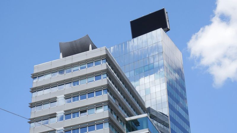 Modern office building under blue sky