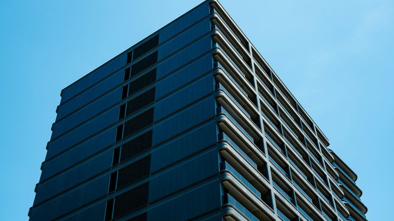 Modern commercial building under blue sky