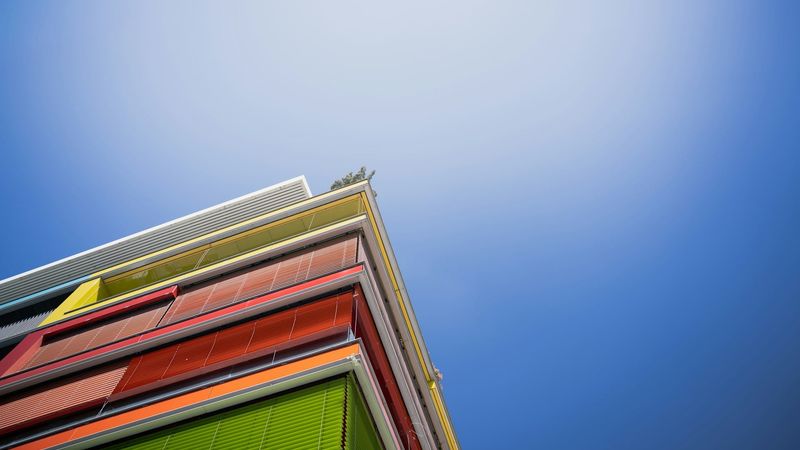 Modern office building under blue sky