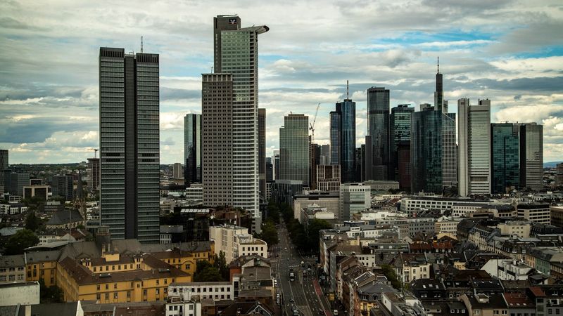 Modern financial district under bright sky
