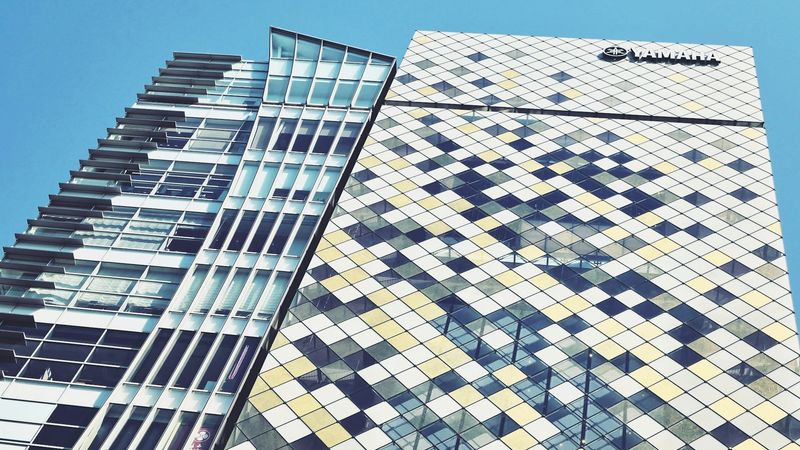 Modern office building under bright sky