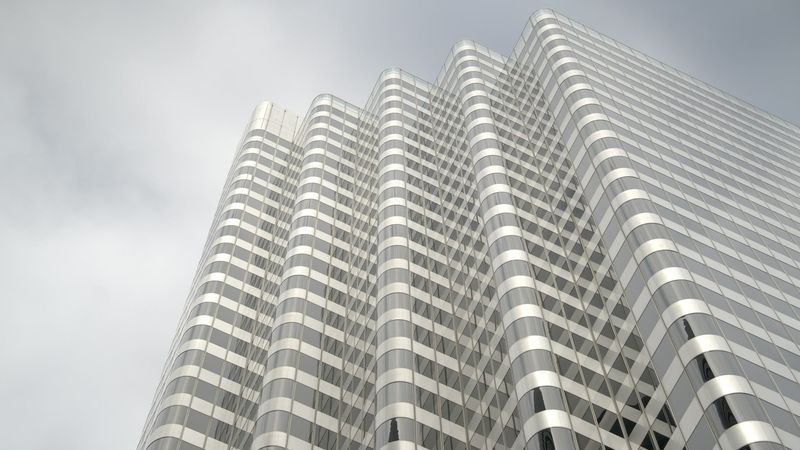 Modern skyscraper reflecting sunlight