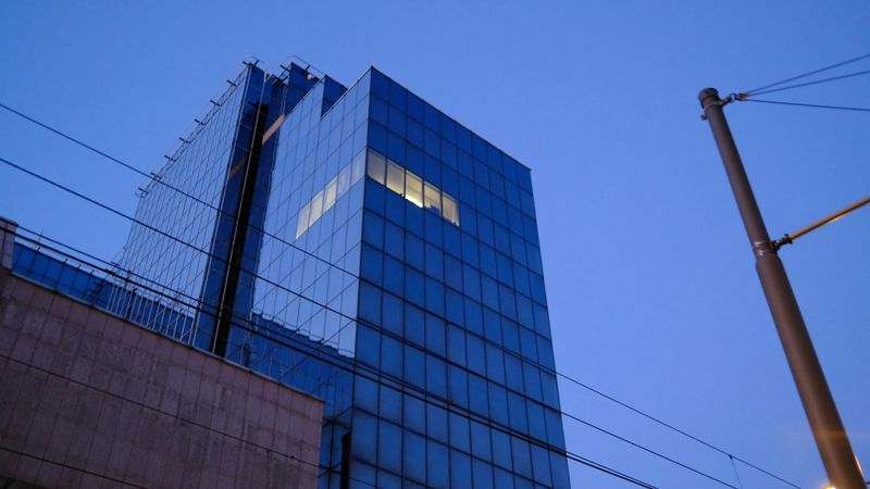 Modern office building under blue sky