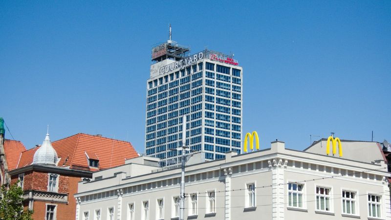 Modern office building under blue sky