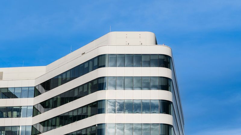 Modern office building under bright sunlight